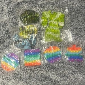 Lot of 8 push pop fidget sensory toys for children and adults. Brand new